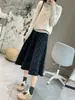 ¡El estilo de la falda es increíble! Falda de lana a cuadros retro para mujer, engrosada y cálida, cintura elástica, falda de longitud media, otoño e invierno, minifalda ajustada