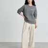 Nova coleção Outono/Inverno 2026: Malha deslumbrante em estilo coreano, sem esforço chique, macia e aconchegante para usar em camadas ou sozinha, moderna para mulheres