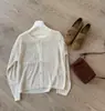 2026 Protección Solar Lino Estilo Coreano Simple Versátil Adelgazante Cuello Redondo Tejido Calado Cárdigan para Mujer Holgado Casual Versátil Mujer