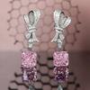 Nova high-end jóias Raydean brincos de corte Super Flash diamante rosa Flor de Gelo corte cheio de brincos de arco de diamante atacado