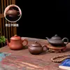 Tetera Yixing Zisha tamaño pequeño para Romper el Té Kung Fu Juego de Té traje Hogar Barro Zhu Xi Shi Antigua Hecha a mano Rompeaguas