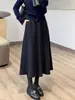 Falda de Lana Gris Oscuro de Cintura Alta para Mujer Primavera y Otoño Estilo Europeo de Moda Entallada que Resalta la Figura Falda Midi de Línea A tipo Paraguas