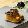 Botas amarillas para niños 2026 otoño nuevo zapatos para niños botas de cuero genuino de moda estilo británico botas Martin para niños y niñas
