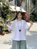 Fotos Reales de la Nueva Colección Primavera 2026: Camiseta Blanca + Falda con Tirantes a Cuadros + Pantalones Anchos Cropped