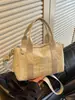 Bolso de mano pequeño moderno y a la moda para mujer 2026 nuevo bolso de hombro cruzado casual bolso de mano versátil para el trabajo transfronterizo