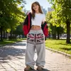 Pantalones deportivos casuales retro transfronterizos europeos y americanos para mujer, pantalones casuales versátiles de pierna ancha, holgados, estampados y fluidos con cordón para mujer