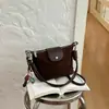 2026 Nova Bolsa de Bolinho Retro Suede Maillard, Bolsa Transversal Simples Transfronteiriça, Bolsa Versátil de Moda de Nicho