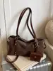 Bolso de hombro retro con acabado mate para mujer, nuevo estilo 2026, versátil para ir al trabajo, bolso bandolera de moda, bolso elegante para debajo del brazo, bolso baguette con un toque de alta gama