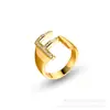 Europa y Estados Unidos nuevo anillo de 26 letras inglesas moda femenina simple apertura ajustable micro incrustación anillo venta al por mayor de fábrica
