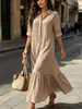 Vestido casual de estilo perezoso para mujer, de color liso, con cuello de camisa, diseño de botón trenzado y bajo con volantes, para uso transfronterizo.