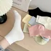 Meias cor pura algodão meias curtas finas respiráveis absorventes de suor primavera e outono estudante punho largo meias brancas pós-parto