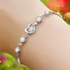 Joyería de circonita de temperamento para mujer, pulsera simple de moda coreana, diseño de corazón de amor de alta gama, joyería de espejo cruzado al por mayor