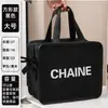 Bolsa de maquiagem xadrez houndstooth ins com letra R bolsa de armazenamento de cosméticos moderna portátil de grande capacidade bolsa de mamãe armazenamento de viagem