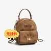 Al por mayor 2026 Nueva Mochila Pequeña para Mujer Elegante Versátil Estilo Coreano Linda Bolso de Doble Hombro Super Caliente Gama Alta Exquisita
