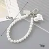 Ins Nuevo Colgante de Llavero con Lentejuelas y Lazo de Perlas para Funda de Teléfono Móvil Accesorios de Correa de Muñeca para Lanyard de Teléfono Móvil