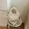 Bolso de tejido de alta gama de nicho para mujer, nuevo bolso cruzado versátil de moda 2026, bolso de mano exquisito, bolso tipo cubo
