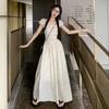 Vestido de estilo universitario francés con lunares y escote cuadrado para estudiantes femeninas, falda holgada de cintura media y elegante estilo coreano.