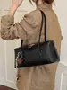 Elegante bolsa de almohada con patrón tejido para mujer, nueva moda 2026, bolso cruzado Boston versátil para hombro