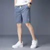 Shorts de algodão Xinjiang de verão, calça casual, calça lisa de corte solto com cordão moda 2026, calça masculina atlética e casual de comprimento médio