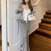 Conjunto de Tres Piezas Estilo Coreano Perezoso Rayas Adelgazante Chica Atractiva Diseño de Nicho para Mujer Top de Tirantes Conjunto de Cárdigan y Falda
