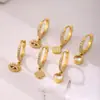 Rueda de la fortuna transfronteriza nicho ins pendientes de acero inoxidable con incrustaciones de circonita chapados en oro de 18 quilates pendientes que no se decoloran venta al por mayor