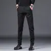 Hong Kong 2026 Outono/Inverno Calças Casuais Masculinas Espessadas com Veludo Plus Calças Longas Versáteis para Negócios Calças de Terno Estilo Coreano Slim Fit Masculinas