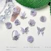 Nuevos accesorios para uñas Joker viento ins morado grisáceo flores pequeñas tridimensionales luminosas mixtas accesorios para usar al por mayor