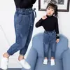 Jeans para Meninas em Estoque, Estilos de Primavera e Outono, Modernos, Tamanho Médio, Meninas Pequenas, Roupas Infantis para Bebês e Crianças Atacado Calças Casuais