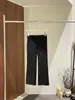 [Kaipu] Pantalones de Nueve Puntos Acampanados Texturizados Elásticos Sueltos Simples de Otoño con Trece Líneas Color Sólido Casuales para Mujer KA6210