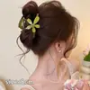 Elegante pinza de garra retro versátil, pinza de tiburón floral de lujo ligero primavera/verano, nuevo accesorio para el cabello de pinza de garra dulce y simple 2026