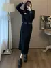 Elegante traje de falda de moda negro para mujer, nuevo estilo de otoño, conjunto elegante y adelgazante de sudadera y falda de dos piezas