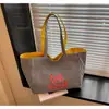 Bolsa Tote de Lona Dupla Face Cor Nova Verão 2026 Feminina Estilo Coreano Casual Grande Capacidade Bolsa de Ombro Listrada em Jeans