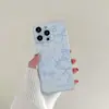 Venta al por mayor directa de fábrica, funda para iPhone 17PM color azul claro con moño estilo girly, funda transparente con bolsa de aire anticaídas, personalizable