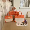 Bolsa de Luxo para o Dia a Dia para Mulheres 2026 Nova Versátil Casual Transversal Popular Bolsa de Mão para o Trabalho Bolsa Platina