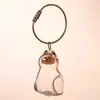 Colgante Creativo de Dibujos Animados para Guardar Pelo de Mascota Perro Golden Retriever Llavero de Almacenamiento Encanto para Bolso Cápsula Colección Conmemorativa