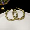 Pendientes de Plata Redondos Geométricos Retorcidos en Espiral Incrustados de Diamantes de Lujo Ligero Pendientes de Aguja Plateada Cruzados Metálicos Simples de Nicho de Alta Gama