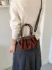 Nuevo bolso de moda de nicho con pliegues en la axila para mujer, bolso de hombro vintage de alta gama para el día a día, bolso de mano popular
