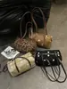 Bolso de hombro retro de lunares de moda japonesa y coreana transfronterizo 2026 otoño nuevo versátil de gran capacidad para el trabajo