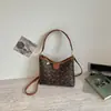 Bolso de Mano para Viajes de Verano 2026 Nuevo Elegante y a la Moda Simple de Moda con Estampado, Textura Relajada y Personalidad Única para Mujeres