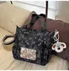 Versión Coreana de la Nueva Mochila Estilo Ins de Alta Apariencia Estilo Universitario Fresca y Linda con Oso para Estudiantes de Secundaria y Preparatoria, Mochila Ligera