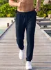 Pantalones largos de retazos texturizados para hombre de Amazon transfronterizos con cordón en la cintura elástica, pantalones deportivos casuales para exteriores con múltiples bolsillos