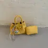 Bolso tipo cubo de moda transfronterizo estilo coreano para mujer, nuevo modelo de verano 2026, bolso de mano de alto valor, bolso pequeño de hombro y cruzado