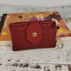 2021 Nova Moda da Internet Celebriedade Bolsa de Moedas Trançada Bolsa de Armazenamento para Batom Fone de Ouvido Carteira Pequena com Zíper Bolsa Curta para Moedas