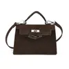 Bolsa Satchel Textura Retrô Bolsa Kelly Feminina 2025 Nova Moda Bolsa de Mão Versátil Uma Alça Transversal Pequena Quadrada