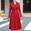 Elegante y moderno vestido de color liso con cuello de polo abotonado y manga larga para mujer, nuevo estilo de otoño, falda larga de línea A que ciñe la cintura, transfronterizo