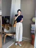 Camiseta de punto de seda helada azul marino con cuello polo, hombro derecho, manga corta para mujer, verano, elegante de alta gama, top ajustado con solapa