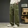 Calça de trabalho de algodão da moda estilo americano com múltiplos bolsos para homens, nova para primavera/outono, casual, corte solto, versátil, cor sólida, perna reta