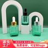 Nueva botella cuentagotas de vidrio verde de fondo grueso de 150 ml, botella de esencia embotellada, botella de esencia, botella de cosmética, material de embalaje