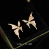 Brincos Borboleta Líquida com Zircônia Microincrustada e Design Único, Zircônia Microincrustada, Luxo Leve, Sensação de Alto Padrão, Brincos de Elegância Francesa