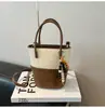 Moda de Comercio Exterior Retro Bolso Pequeño para Mujer 2026 Nuevo Invierno Versátil Bolso Cruzado de Hombro de Gama Alta Tipo Cubo de Moda